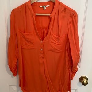 Beautiful orange top.